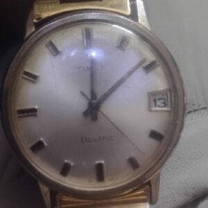 Timex Electric Gold  Watch With Date And Crown On Back
